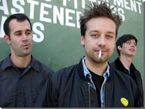 [ david link, alex newport, ches smith - photo by jean-michael aubert ]